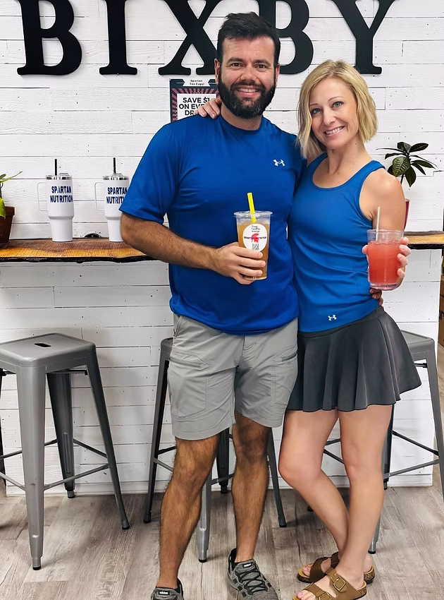 Jon Henthorn and a co-owner inside a storefront business they operated.